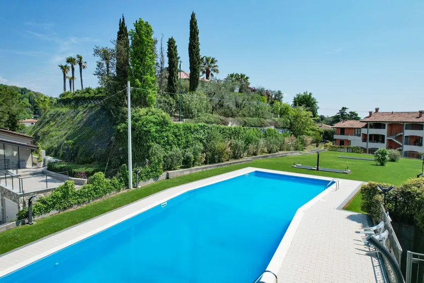 La Pietra del Garda pool lake view by Bookinggardalake - Image 1