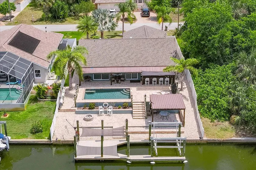 Waterfront Retreat with Pool Tiki Bar & Boat Dock - Image 1