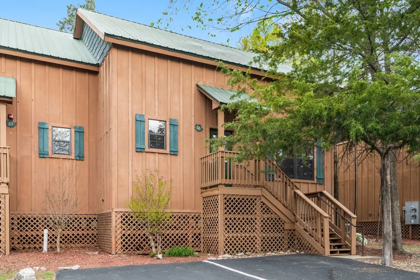 Peaceful 3BR Cabin • Pet-Friendly • Pools • Trails - Image 1
