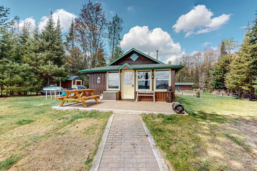 Cozy Lakefront Cabin with Dock & Fire Pit - Image 1