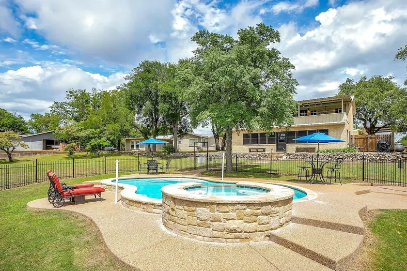 Spacious Lakeview Oasis with Pool + Hot Tub - Image 1