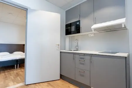 Family apartment with 1 bedroom – Airport shuttle - Image 1
