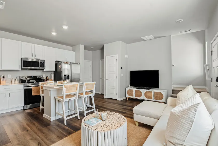 Johnstown Townhome | 2 Ensuite Beds + Garage - Image 1