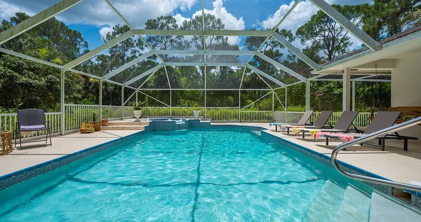 Family Getaway in Jupiter Farms: Fun Pool & Lake! - Image 1