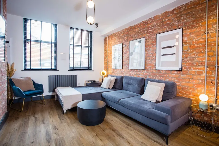 Stay Awhile - Stylish Industrial 2BR Duplex, NQ - Image 1