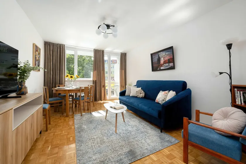 Blue Two Bedroom Apartment in Wrocław with Desk, Bathtub and Balcony by Noclegi Renters - Image 1