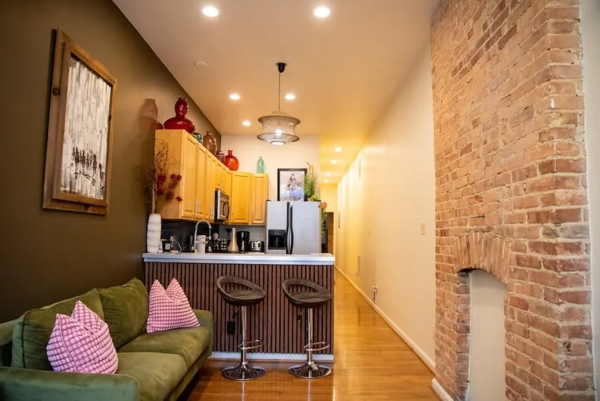 Eclectic Comfort: 2BR w/ Balcony Near MICA & JHU - Image 1