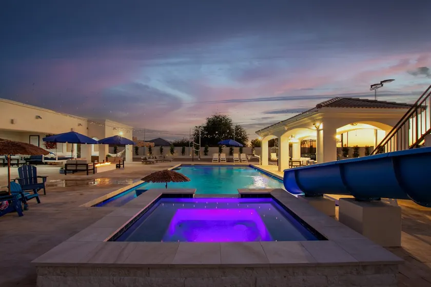 The Grand Oasis-V-ball-30'waterslide-hot tub-sauna - Image 1