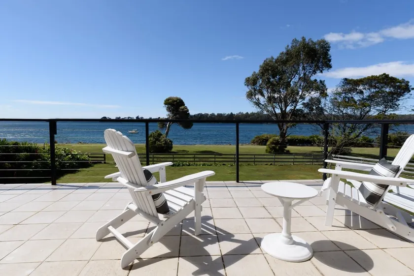 Sunset Sanctuary: Waterfront Home with Balcony - Image 1