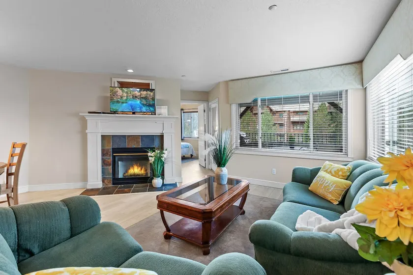 Scenic Waterfront Haven with Private Balcony & BBQ - Image 1