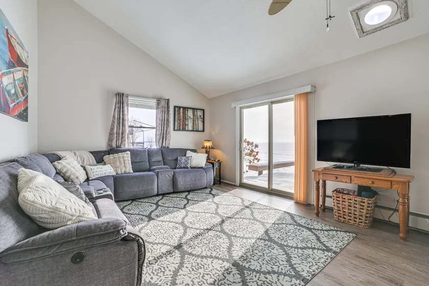Porch + Views: Waterfront Home on Houghton Lake! - Image 1