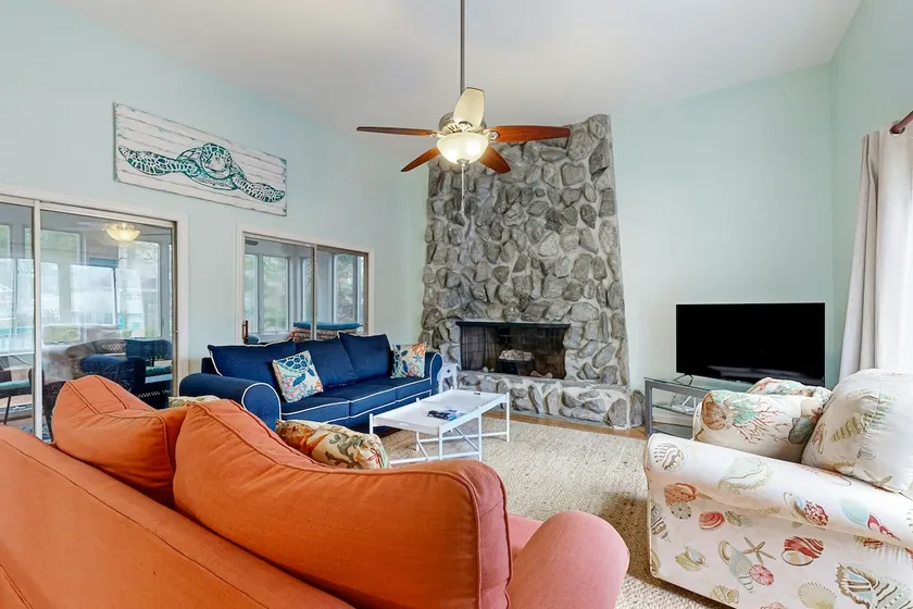 Dog-Friendly Coastal Oasis with Yard & AC - Image 1