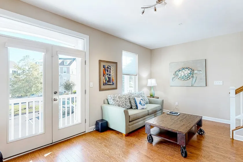 Dog-friendly, water-view townhome with shared pool - Image 1