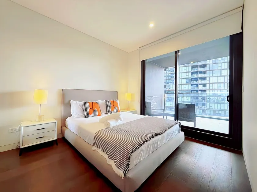 Stylish 1BR | Pool, Gym & Parking by Olympic Park - Image 1