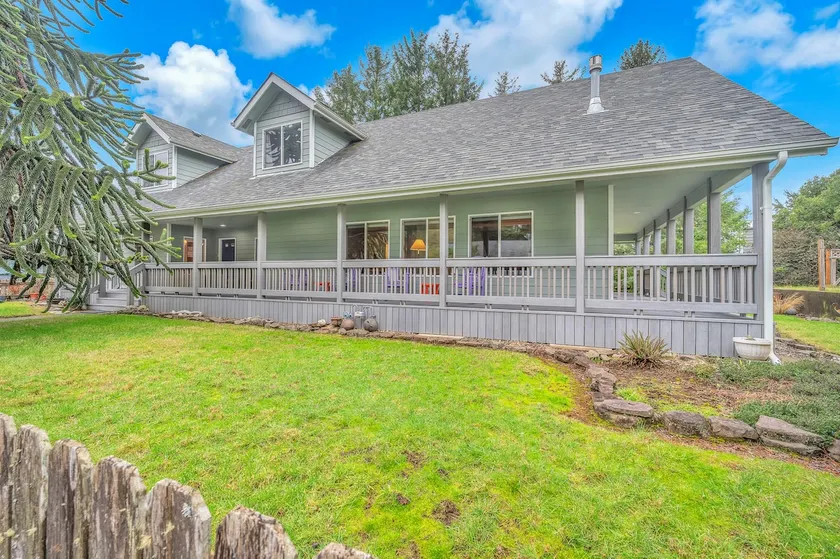 Vaulted Family Home with Wraparound Porch - Image 1