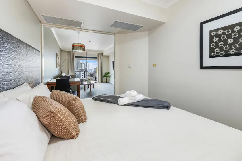 Top Floor Tropical Escape with King Bed, Pool & Balcony - Image 1