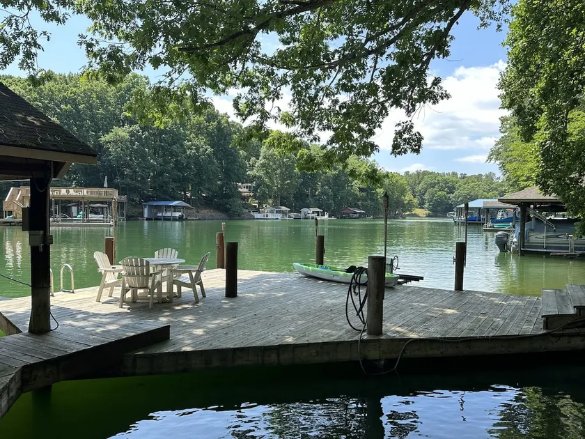 Humble Hideaway - Inviting lakefront home with firepit, balcony & W/D - dog-friendly - Image 1