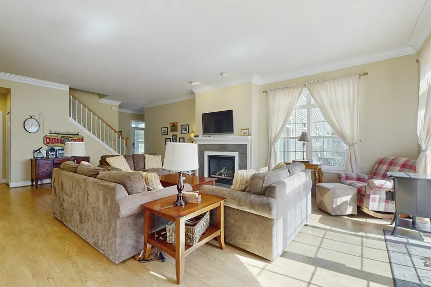 Riverside 2-Story Retreat with Cozy Fireplace - Image 1