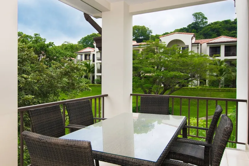 Coastal-Inspired Condo with a Pool-View Balcony & Beach Club Access - Image 1