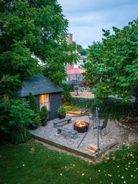 Delightful DT Bungalow | Firepit · Walk to Town - Image 1