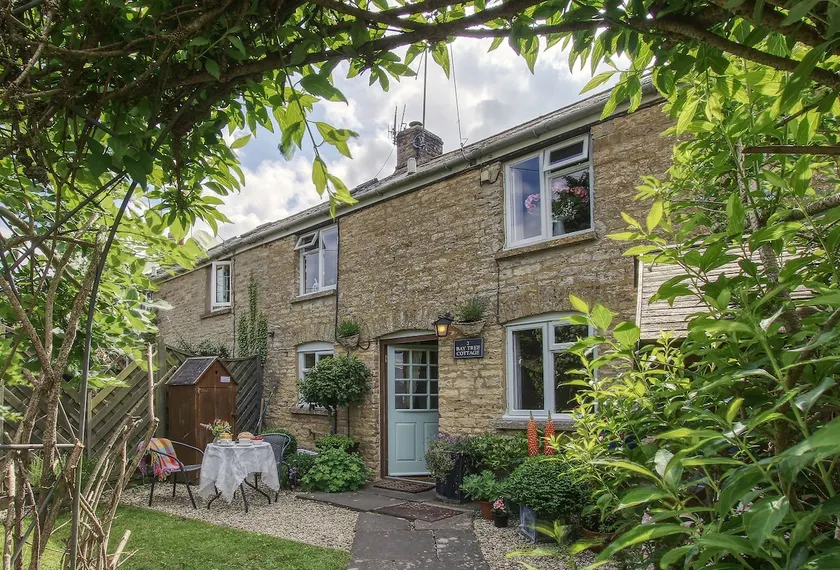 Bay Tree Cottage  is tucked away in an elevated position on the edge of a pretty village. - Image 1