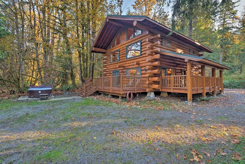 Riverfront Cabin w/ Hot Tub: 2 Mi to Eagle Falls - Image 1