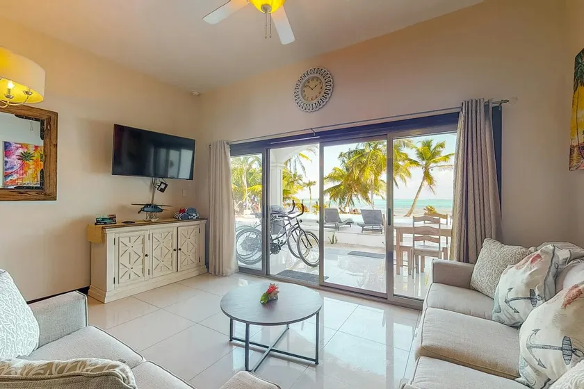 Beachfront dog-friendly condo with pool - walk to ocean from beachfront veranda - Image 1