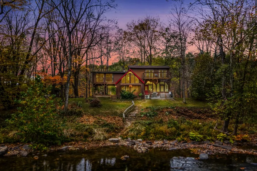 River Time Cabin - Riverfront, Hot Tub, Screen Porch, Fishing, Games, View, 3 King Beds - Image 1