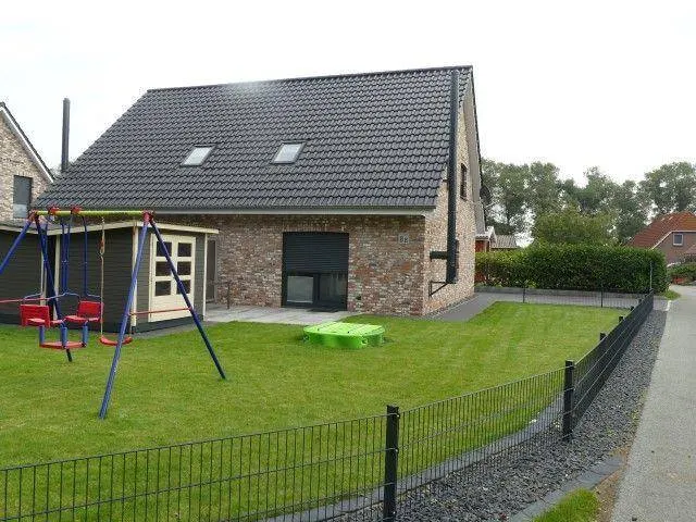 Holiday home with barbecue, garden & hot tub - Image 1