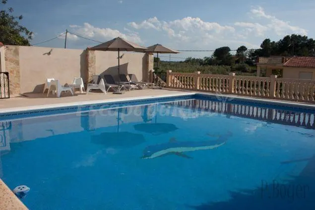 Child-friendly pleasant cottage with pool, terrace & garden | Mountain view | Next to the beach | Pets are welcome - Image 1