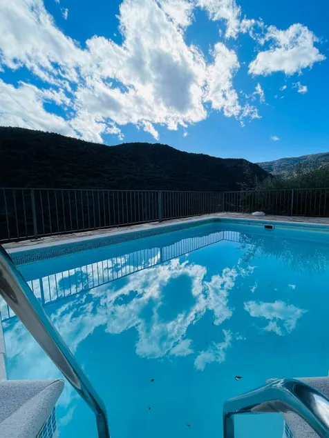 Holiday home with pool, barbeque & hot tub | Pool view - Image 1
