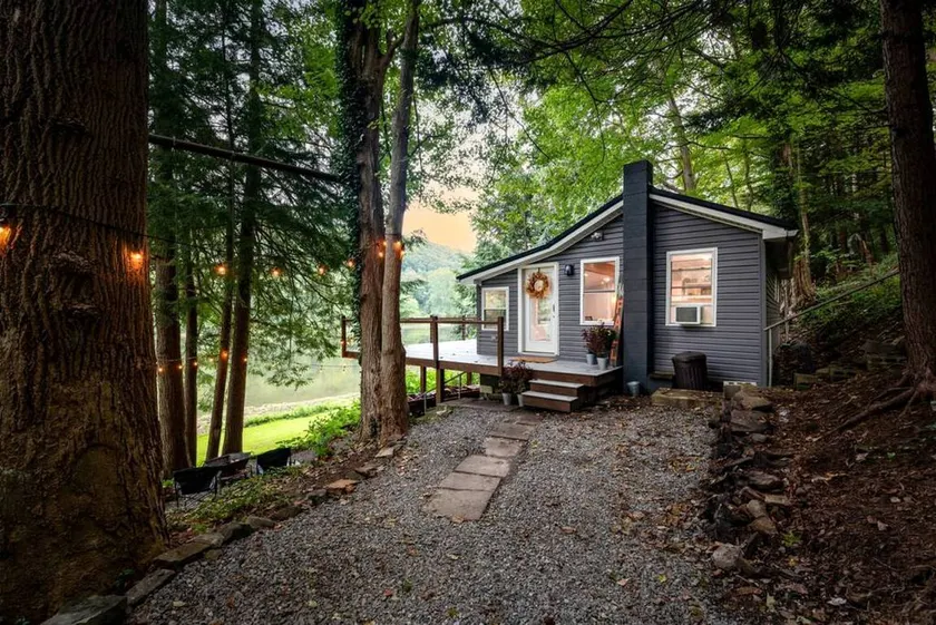 Scenic Retreat: Riverfront Cabin with Large Deck and Fire Pit in Emlenton, Pennsylvania - Image 1