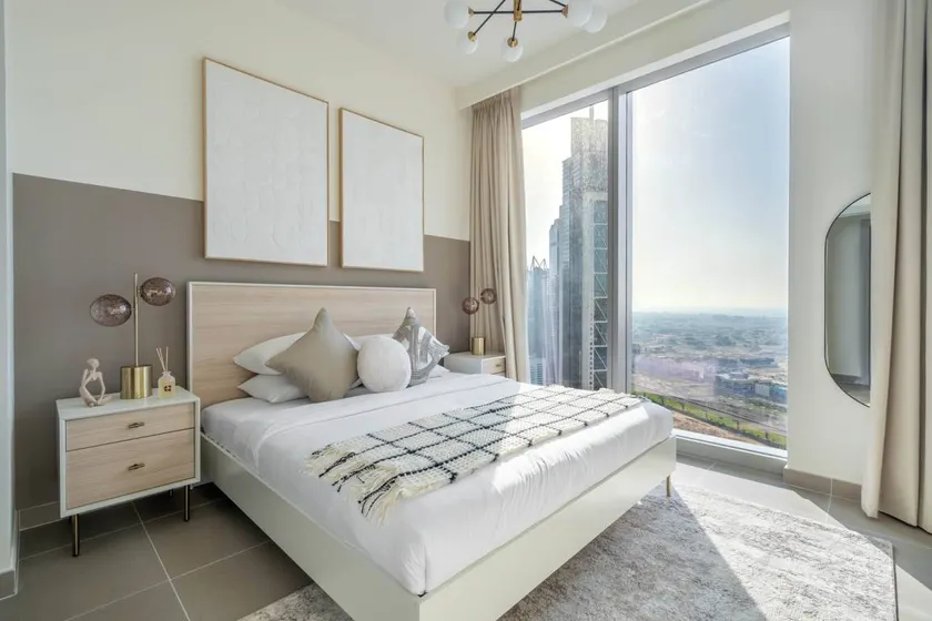 Appartement de vacances avec piscine | Proche Burj Khalifa | Vue mer | Parfait pour le travail à distance - Image 1