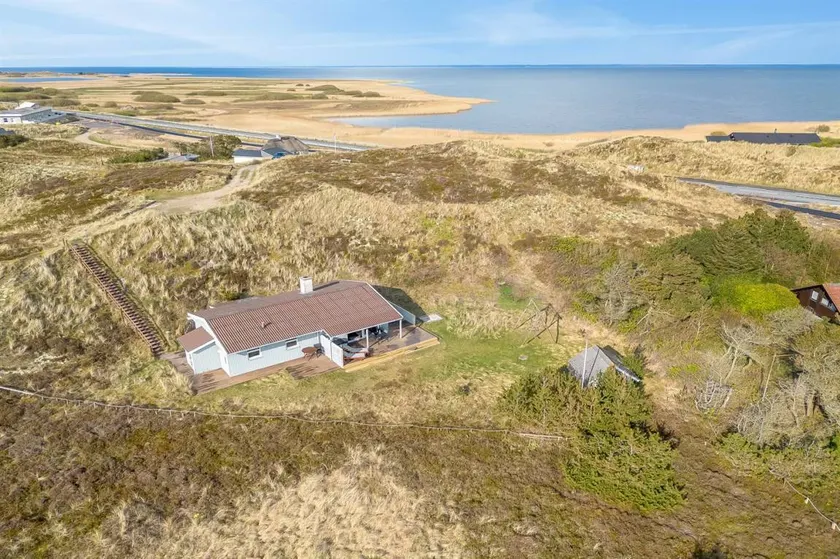 Holiday home with terrace, hot tub & sauna | Water view - Image 1