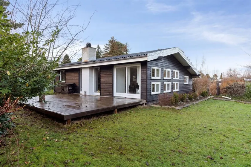 Holiday home with garden, terrace & hot tub - Image 1