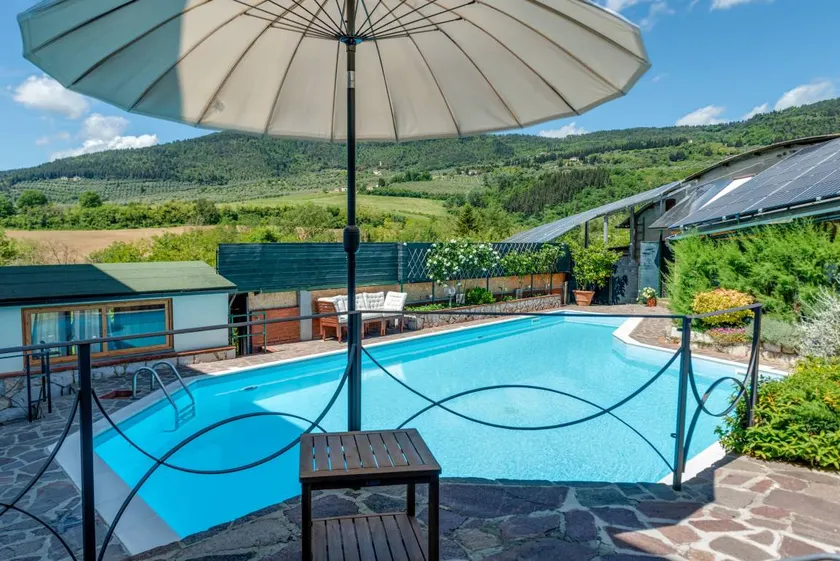 Fantastica casa totalmente attrezzata con giardino, piscina riscaldata e terrazza | Vista sul giardino | Ideale per lavorare da remoto - Image 1
