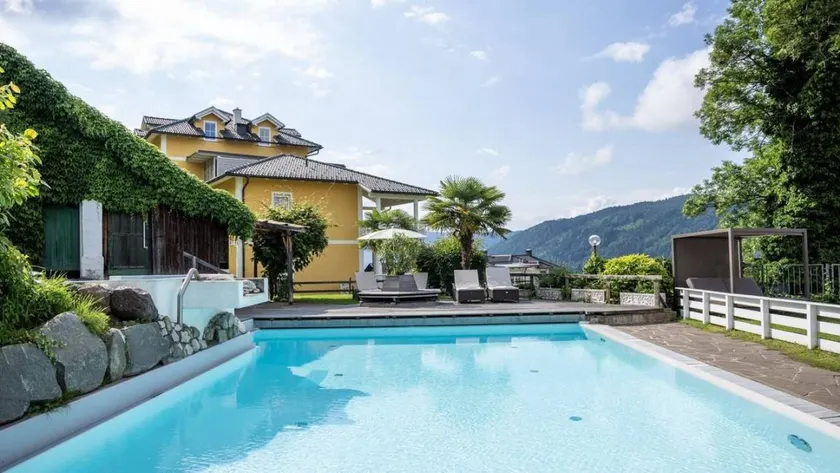 Agréable appartement de vacances adapté aux familles avec sauna, piscine et jardin | Vue lac | Parfait pour le travail à distance - Image 1