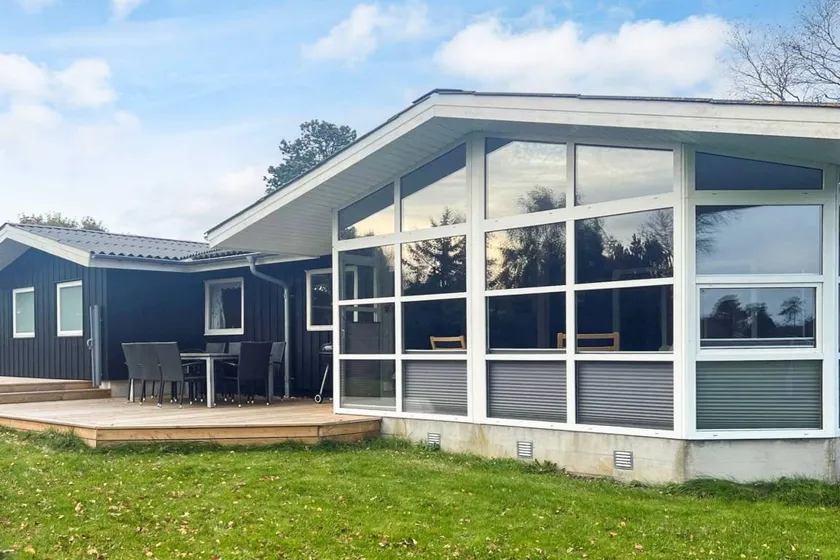 Beautiful holiday home with hot tub, garden & barbecue | Next to the beach | Dogs allowed - Image 1