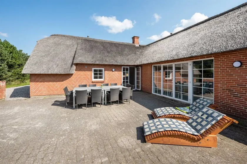 Family-friendly holiday home with BBQ, terrace & sauna - Image 1