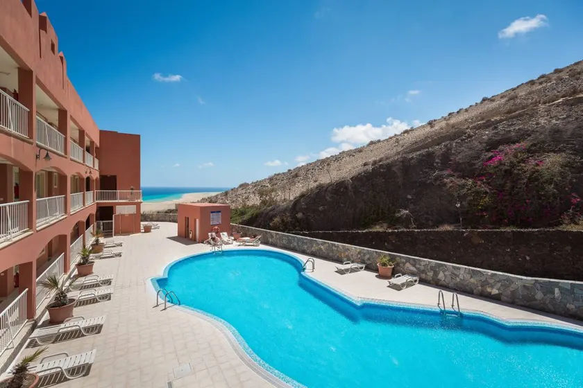 Charmant appartement de vacances avec jardin, terrasse et piscine | Vue ville | À côté de la plage | Parfait pour le travail à distance | Avec animaux bienvenus - Image 1