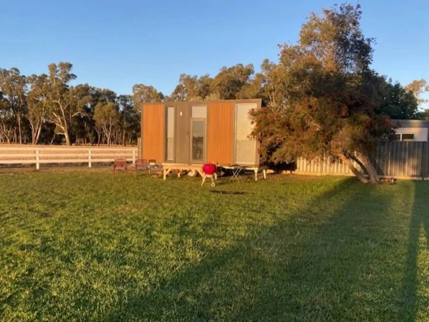Tiny House Stay with Cozy Fireplace and Nature Views in Koonoomoo, Australia - Image 1