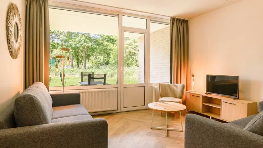 Appartement avec jacuzzi, jardin et sauna - Image 1