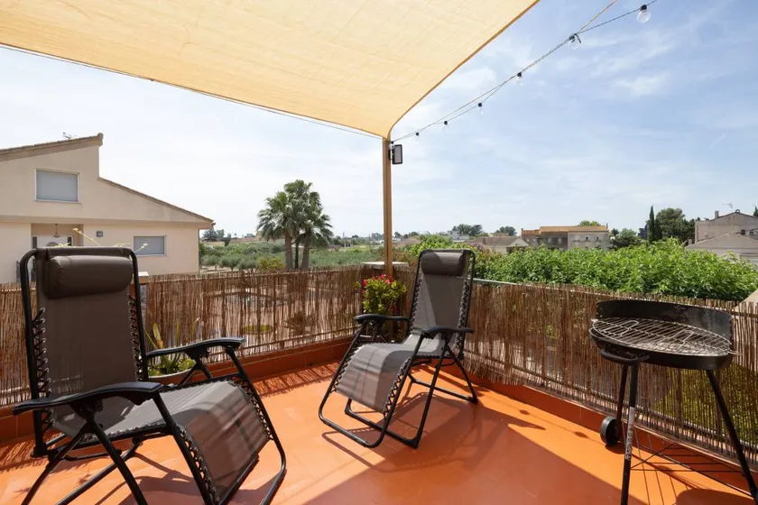 Holiday home with terrace - Image 1
