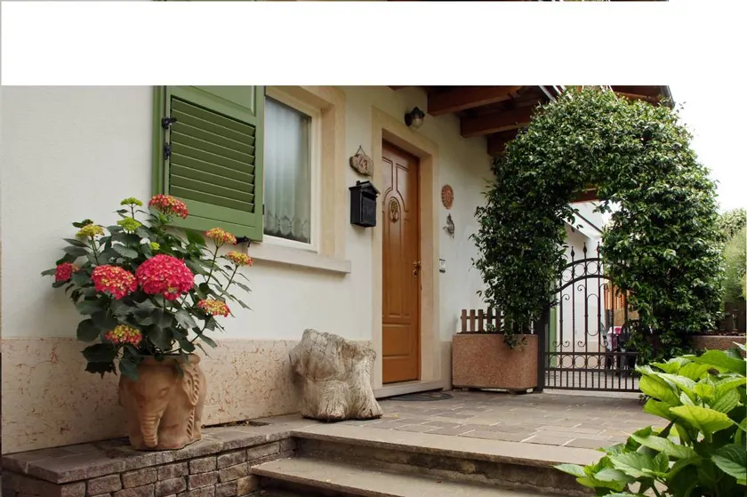 Incantevole appartamento accogliente e familiare con terrazza e giardino | Vista sul giardino - Image 1