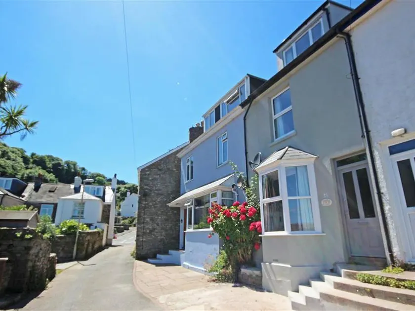 Family-friendly cottage with terrace, hot tub & garden | Beach view - Image 1