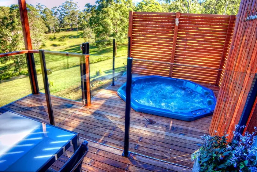 Peaceful Cabin Retreat with Heated Spa & Fireplace in Morayfield, Queensland - Image 1