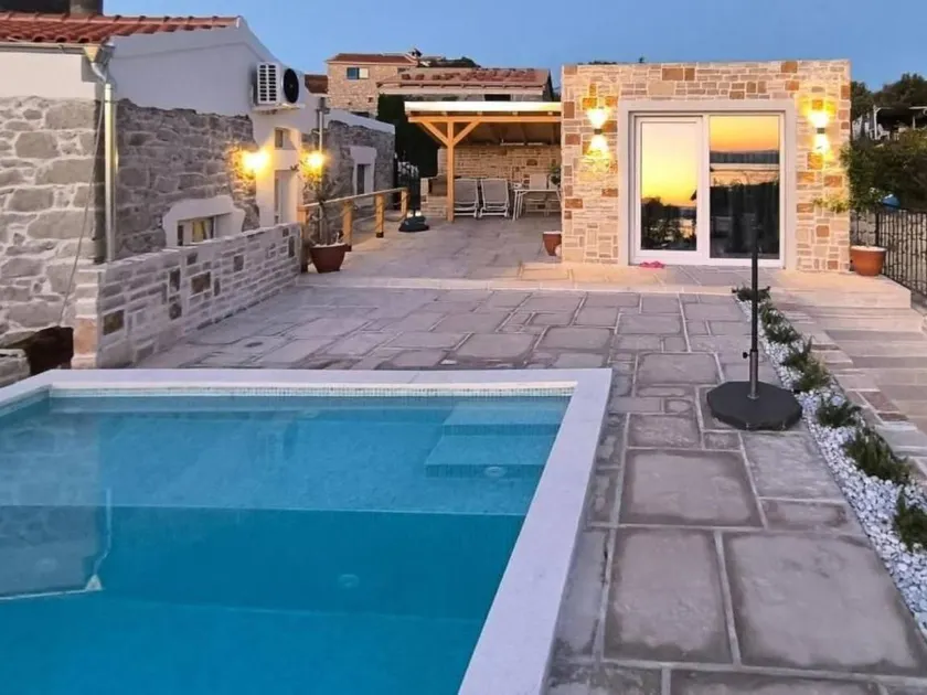 Holiday home with barbecue, private pool & garden | Sea view - Image 1