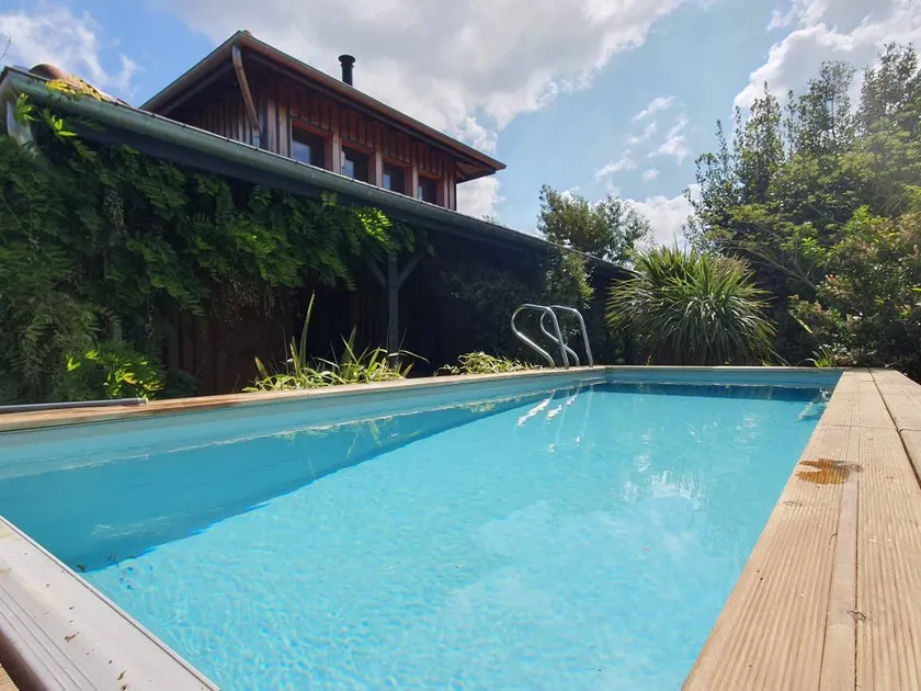 Holiday home with garden, BBQ & private pool - Image 1
