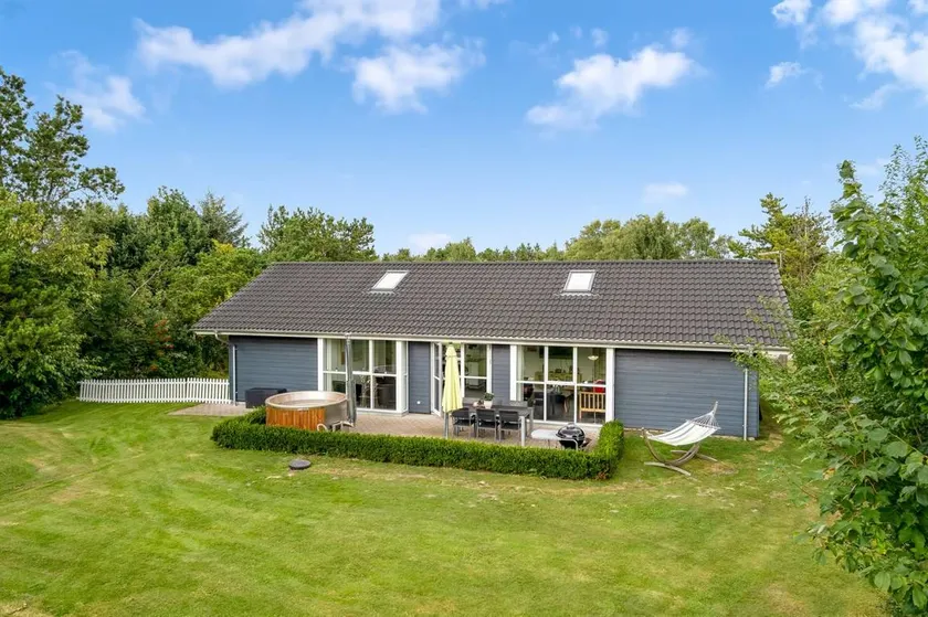 Child-friendly holiday home with garden, terrace & hot tub | Pets are welcome - Image 1