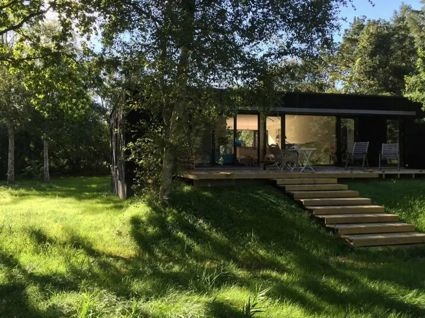 Fully equipped beautiful holiday home with BBQ, garden & terrace | Water view | Next to the beach | Pets allowed - Image 1